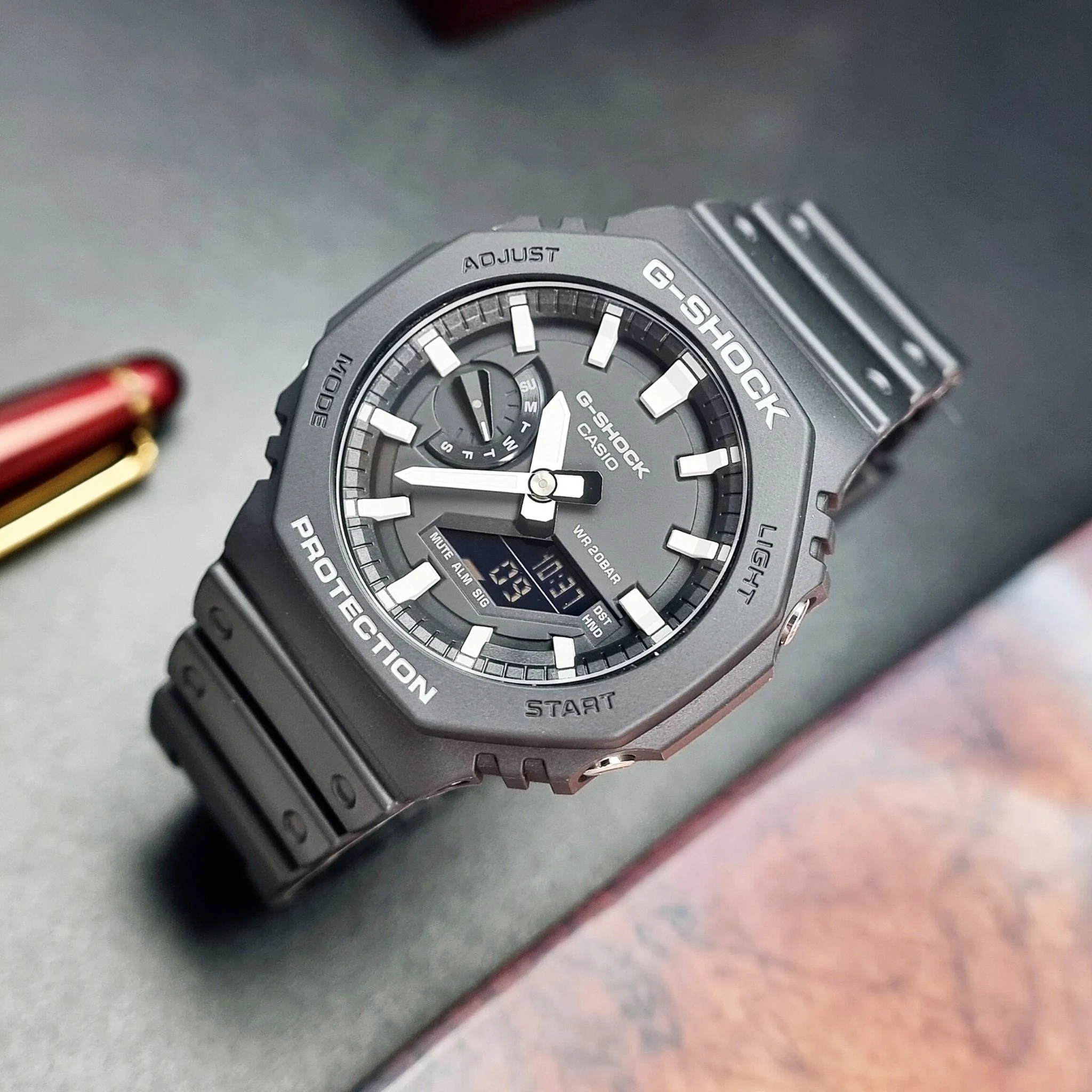Hướng dẫn chỉnh giờ và cài đặt báo thức trên đồng hồ Casio G-Shock GA-2100